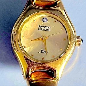 Armitron Now Gold Tone Ladies  Bangle Bracelet Watch